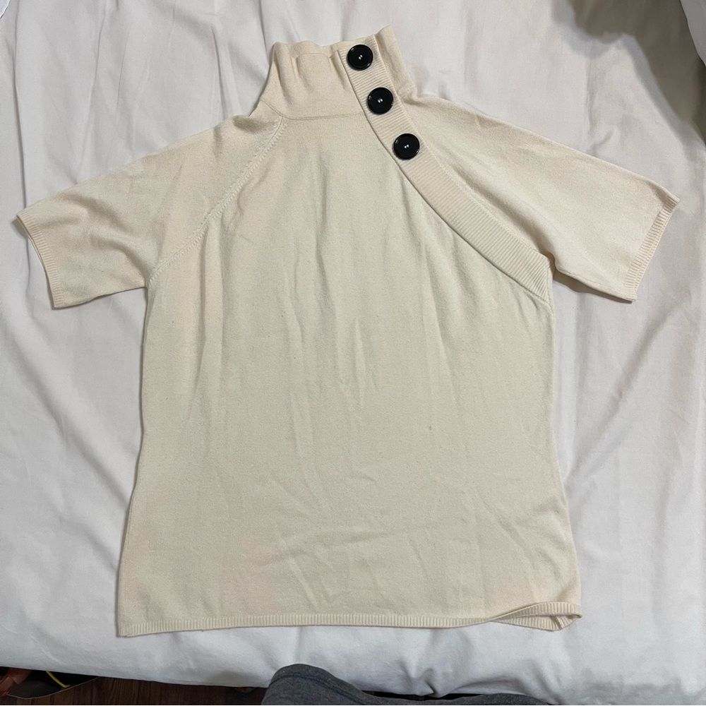 Cream cashmere mock neck top with button detail